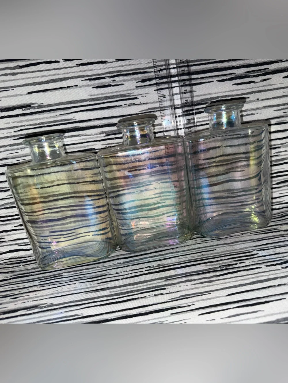 Set of 3 Clear Vases / Bottles With Carnival Glass Like Glaze.